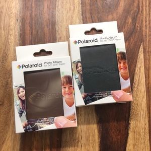 Two Polaroid Photo Albums